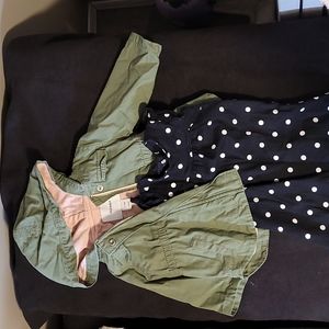 Green Jacket and black Jumper with white polkadots